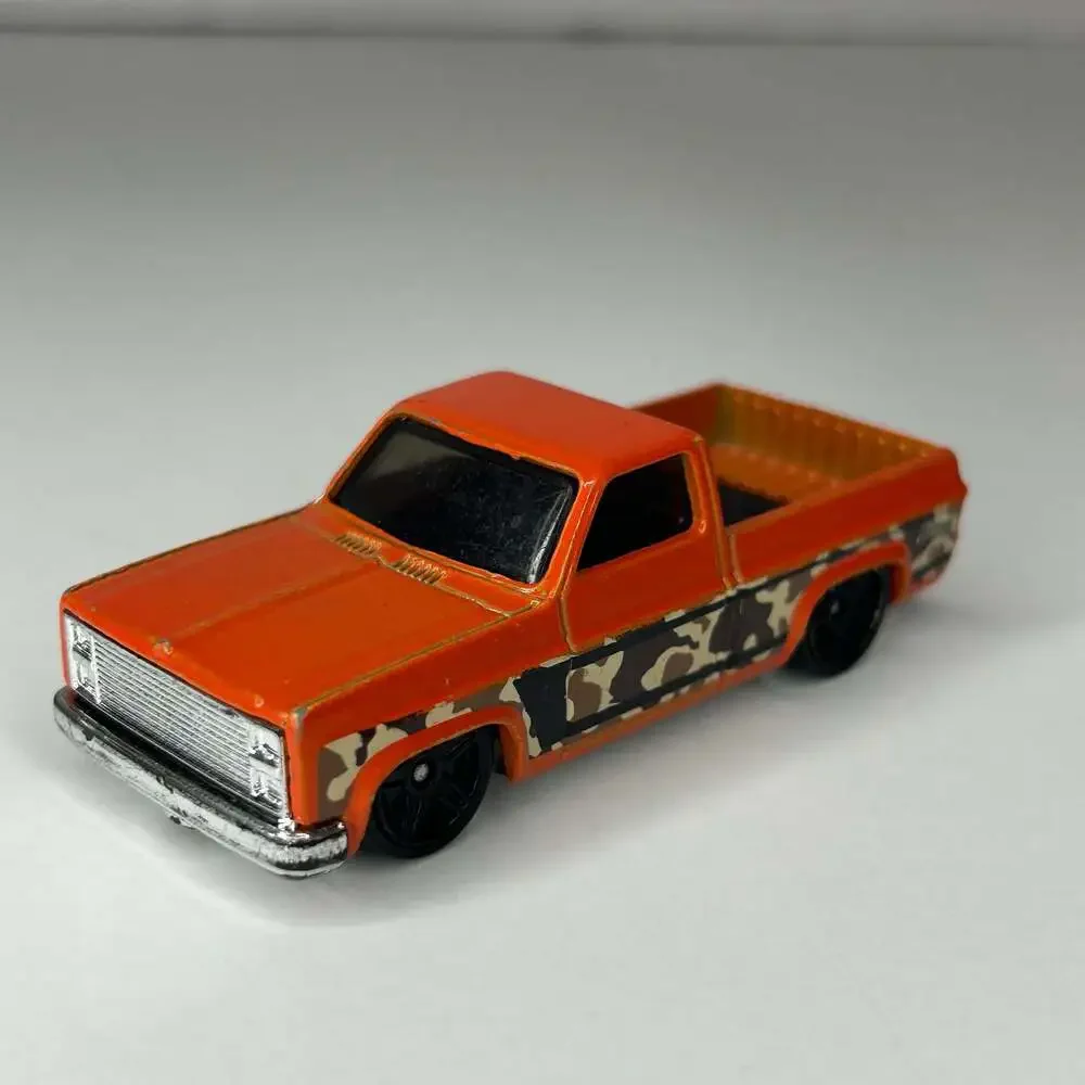 Hot Wheels 83 Chevy Silverado Orange Camouflage Truck